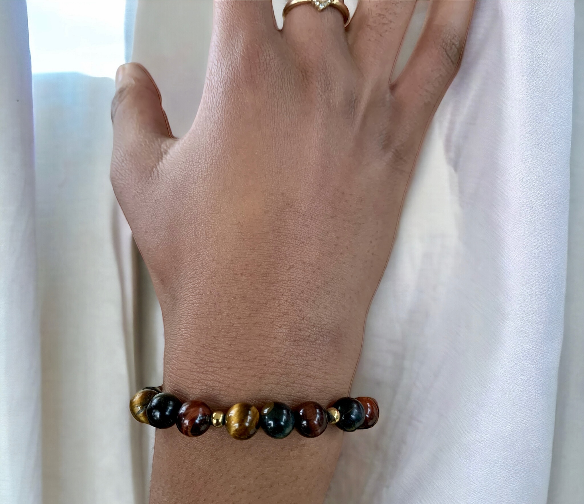Bracelet triple protection de perles naturelles